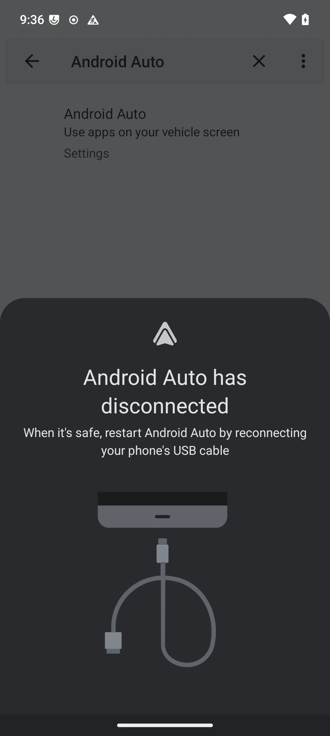 Écran «Android Auto has disconnected», demandant de reconnecter le câble USB du téléphone